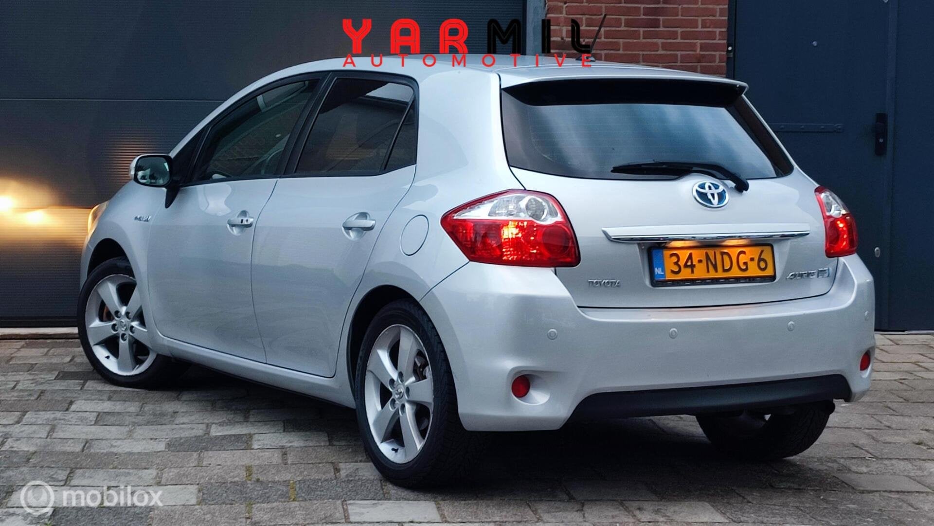 Toyota Auris 1.8 Full Hybrid Executive CLIMA ACHTERUITRIJ CA, Euro 5, Gebruikt, 4 cilinders, Parkeersensor