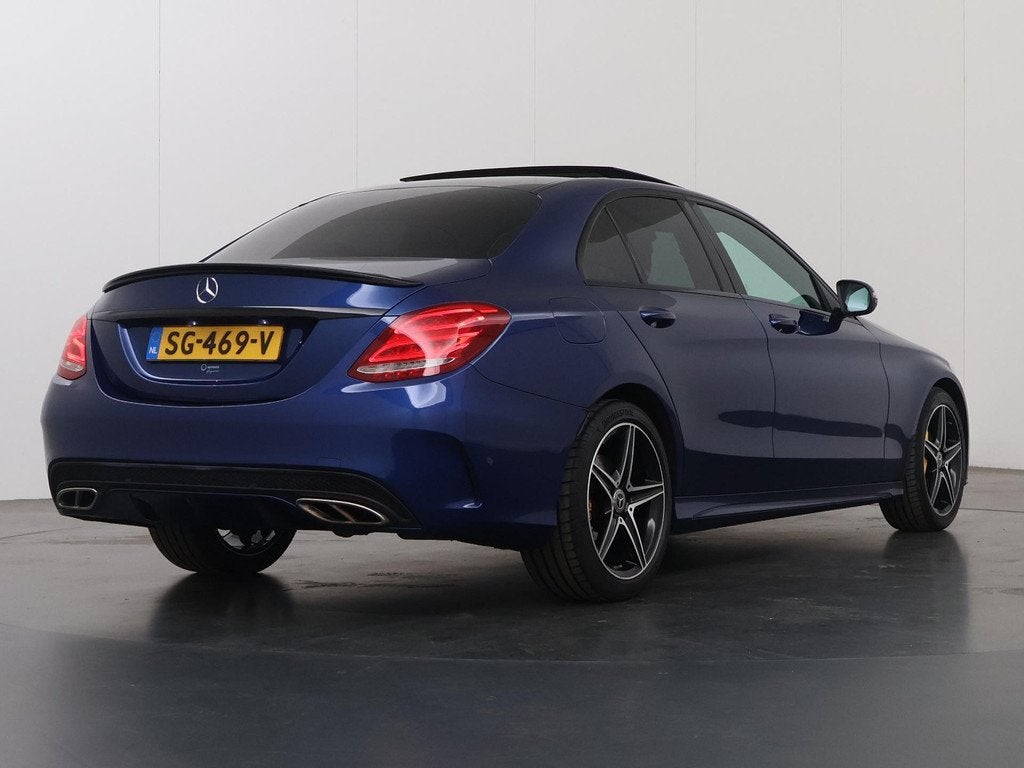 Mercedes-Benz C-klasse 160 Sport Edition | Panoramadak | AMG, Auto's, Mercedes-Benz, 4 cilinders, 129 pk, Blauw, Bedrijf