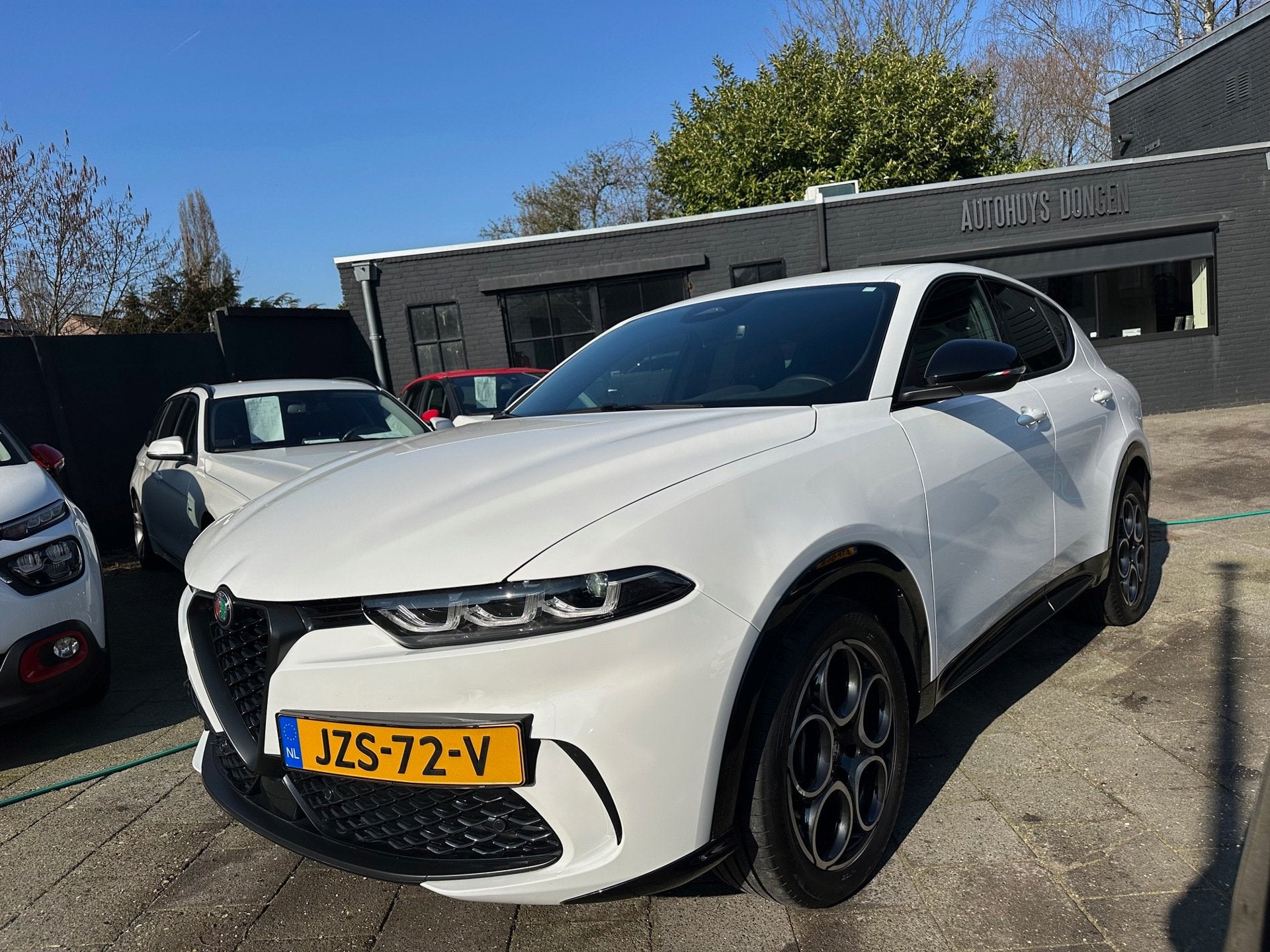Alfa Romeo Tonale 160pk Hybrid Aut|16.000km|Leder|Fabrieksga, Auto's, Dealer onderhouden, Gebruikt, Zwart, 4 cilinders