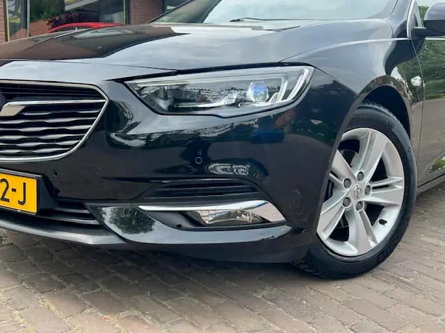 Opel Insignia Grand Sport 1.5 Turbo 140PK Busin € 13.900,0, 4 cilinders, 700 kg, Leder en Stof, Zwart