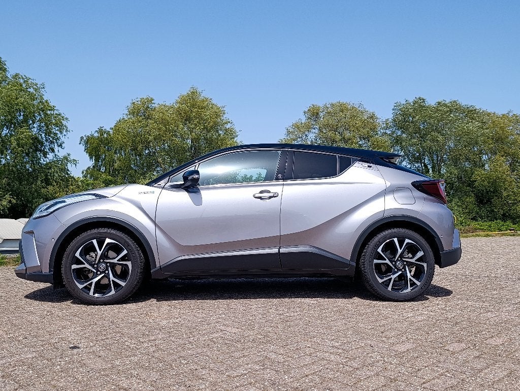 Toyota C-HR 2.0 Hybrid 184pk 2020 Bi-Tone Automaat, Auto's, Toyota, Stof, 725 kg, Zwart, 4 cilinders