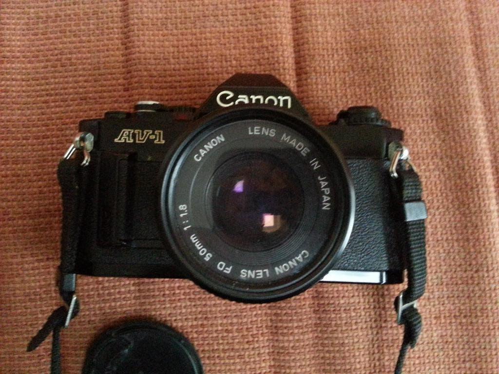 TOPKWALITEIT CANON AV1 MET LENS en TELELENS, Audio, Tv en Foto, Fotocamera's Analoog, Ophalen of Verzenden, Gebruikt, Spiegelreflex