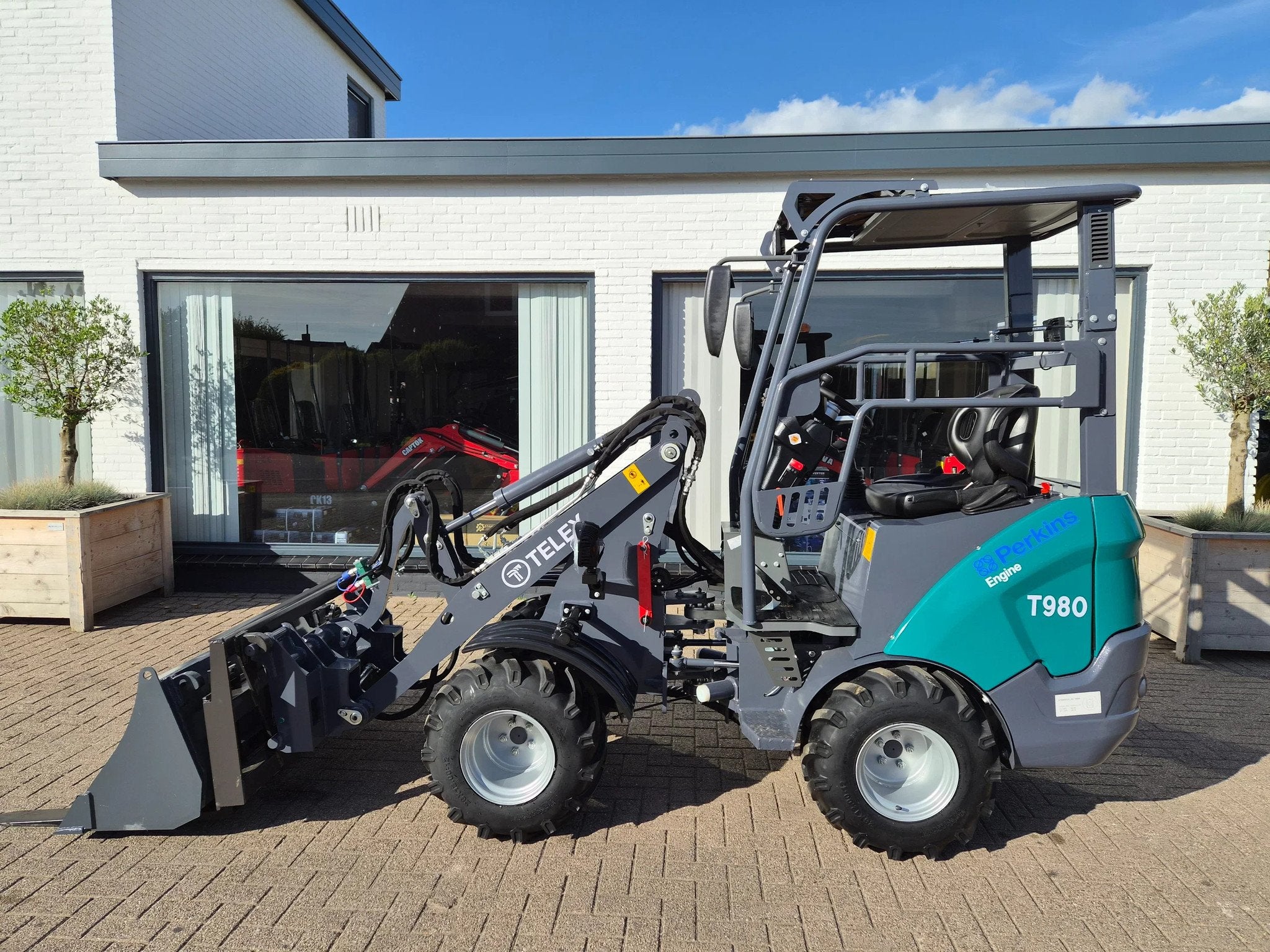 Perkins Telex loader bak en lepels shovel (bj 2026), Wiellader of Shovel