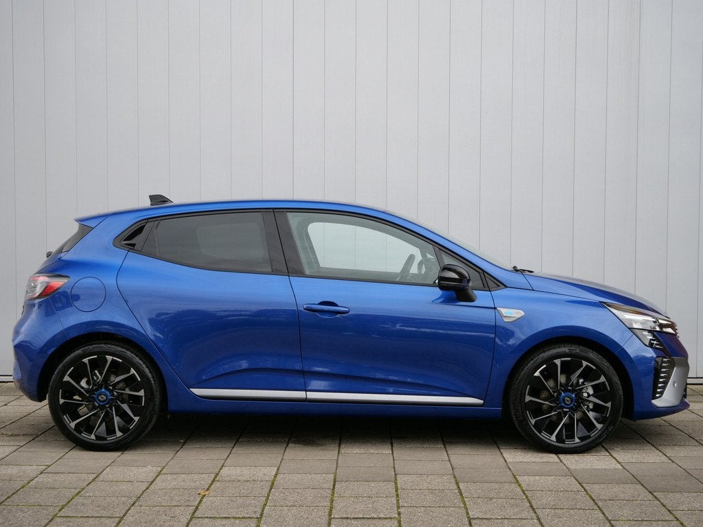 Renault Clio 1.6 E-Tech Full Hybrid 145 Pk esprit Alpine Aut, Auto's, Renault, Blauw, Leder en Stof, 1248 kg, Hybride Elektrisch/Benzine