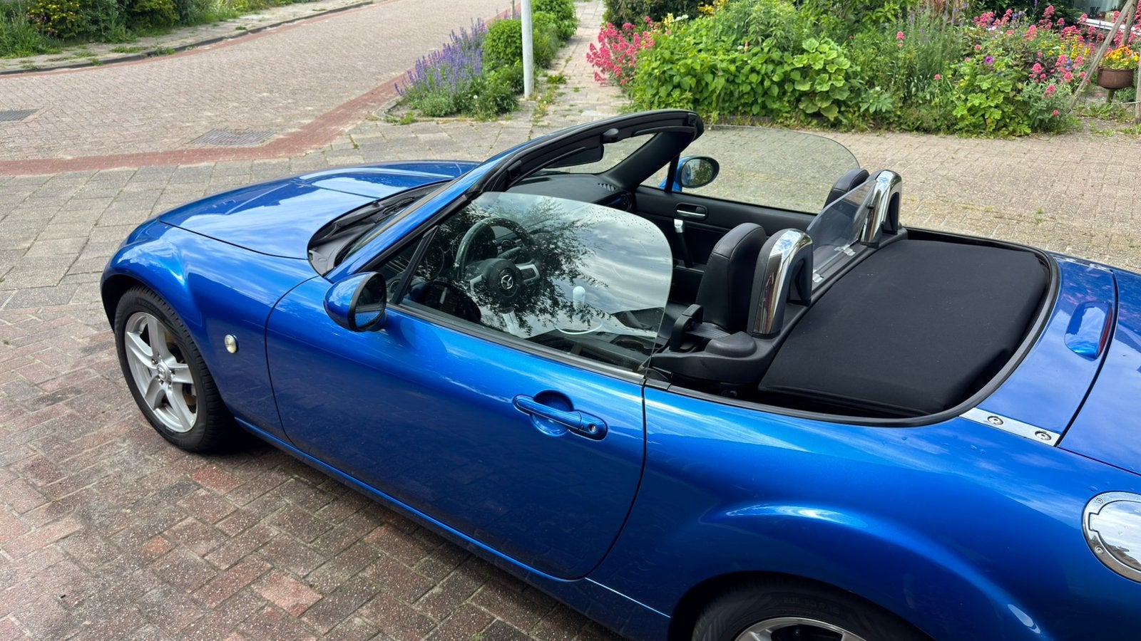 Mazda MX-5 1.8 Exclusive | Leer, Keyless, Carplay, Achterwielaandrijving, Zwart, 4 cilinders, Cabriolet