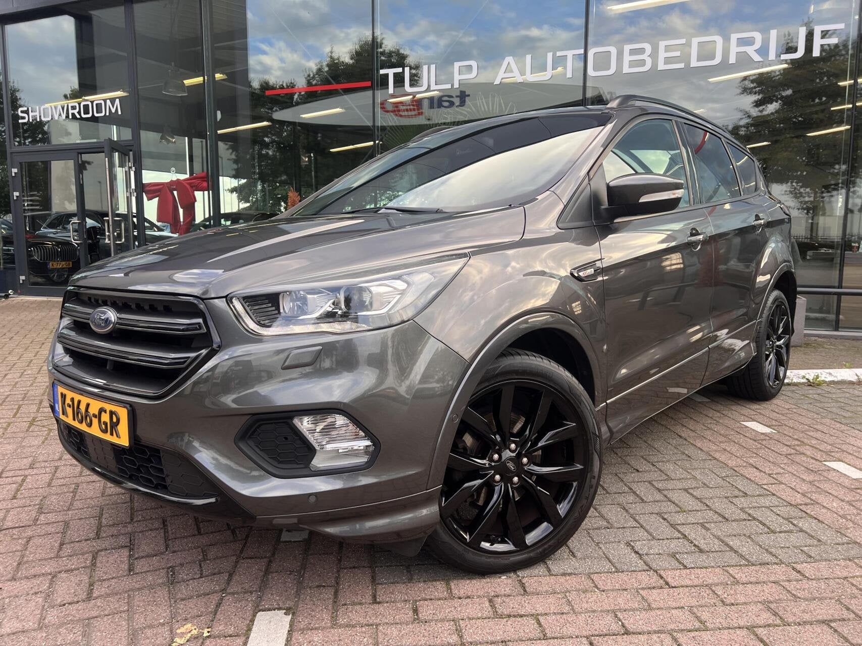 Ford Kuga 1.5 EcoBoost ST Line Clima Cruise Winterpack Trekh, Auto's, Dealer onderhouden, 4 cilinders, Bedrijf, Handgeschakeld