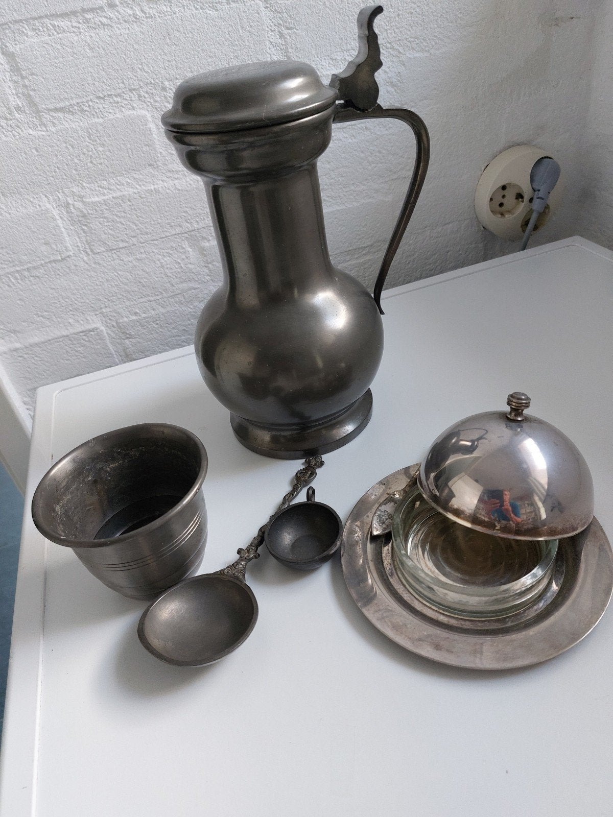 tin en verzilverde botervloot met deksel, Ophalen