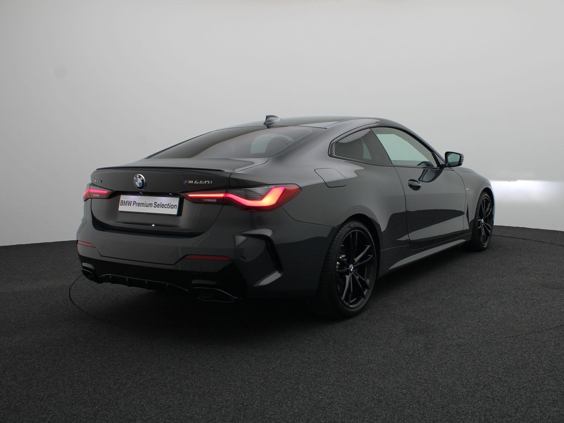 BMW 4 Serie Coupé M440i xDrive High Executive | Elektrisch, Auto's, Automaat, Stof, Met garantie (alle), 4 stoelen