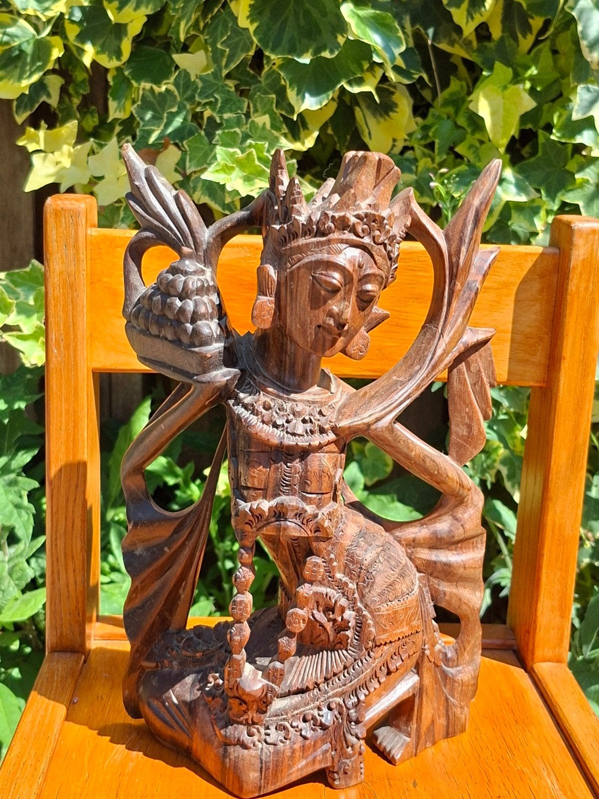 Boeddha houten beeld, Ophalen