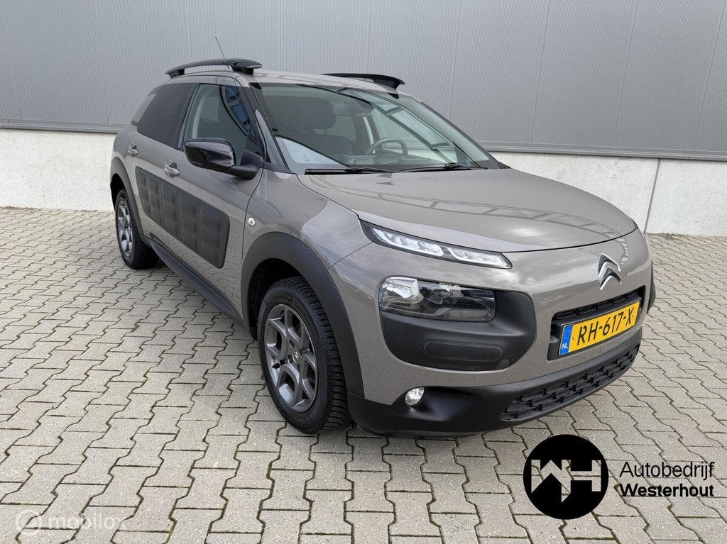 Citroen C4 Cactus 1.2 PureTech Shine|NAVI|CAMERA|PARK.SENSOR, Auto's, Voorwielaandrijving, Gebruikt, 1199 cc, Bruin