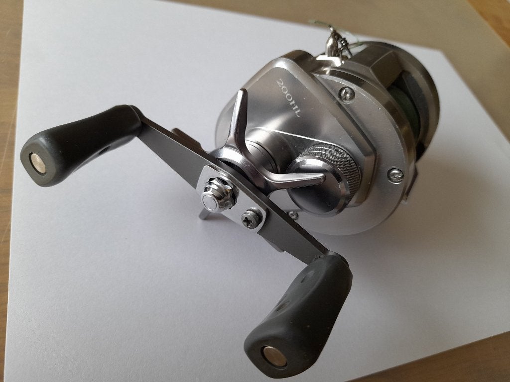 Diawa Pluton 200 HL linkshandige reel CARBON slipschijven, Ophalen of Verzenden, Zo goed als nieuw, Molen
