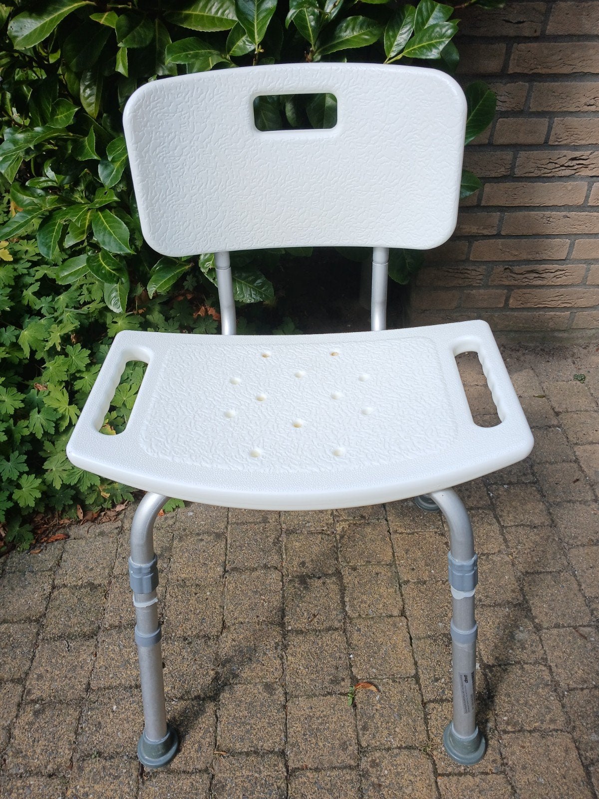 Bad- of douche stoel in hoogte verstelbaar en rollator, Ophalen