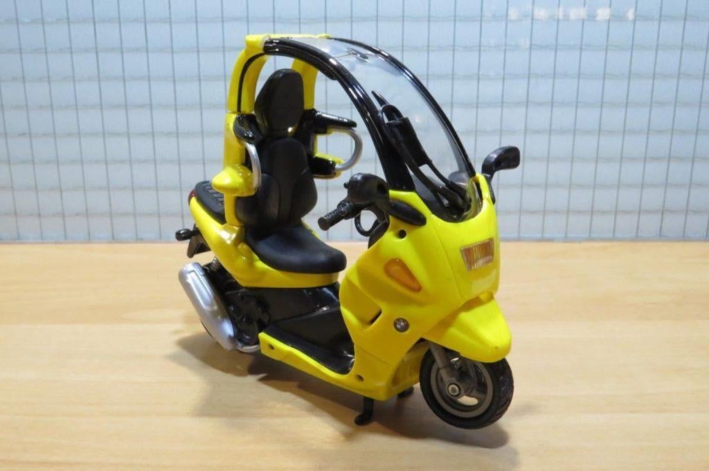 BMW C1 1:16 yell., May Cheong Group France S.A.S., Nieuw, Ophalen of Verzenden, Motor