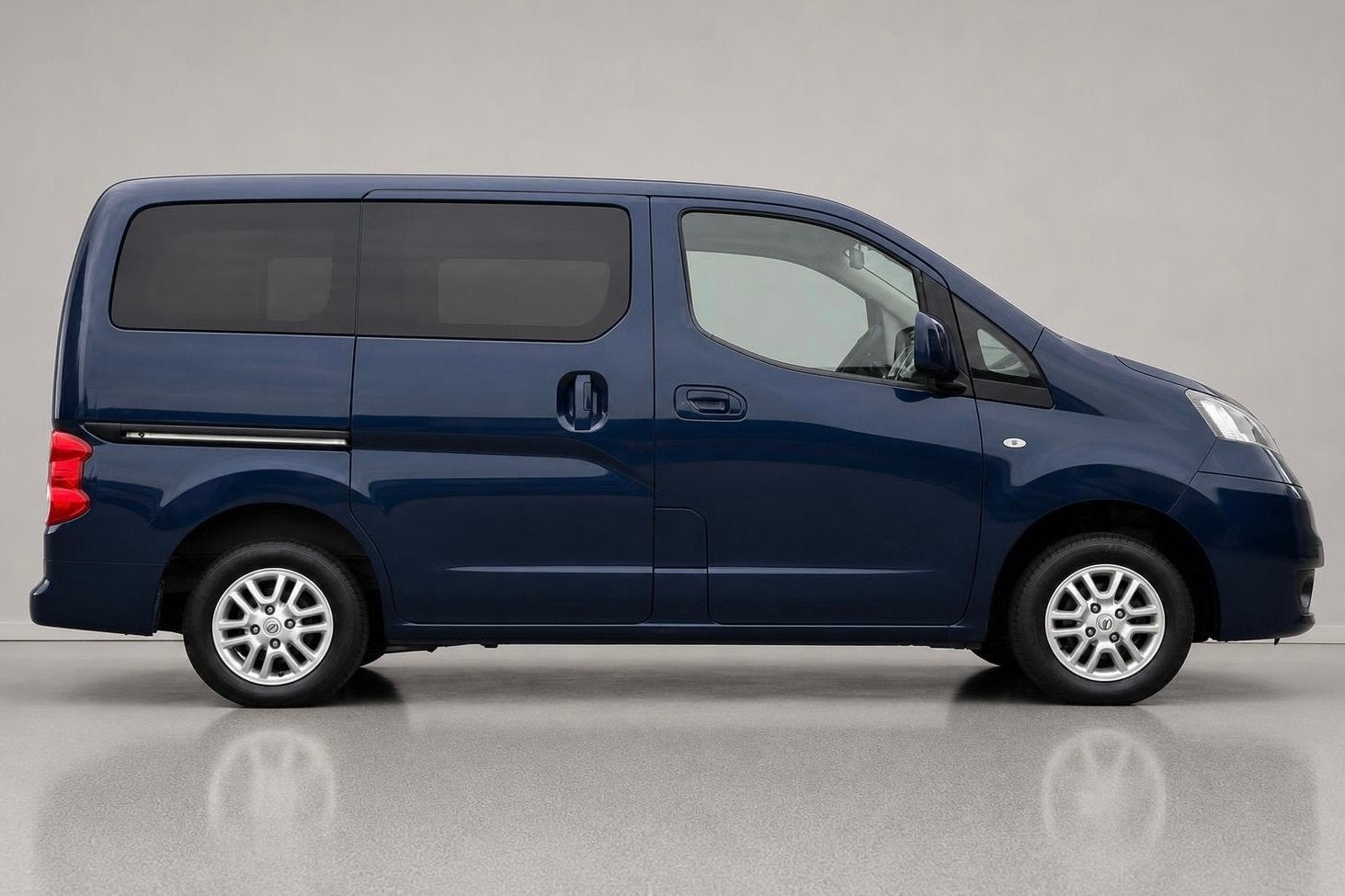 Nissan Evalia NV 200 / AIRCO / KETLESS GO / CAMERA / 7 PERS, Auto's, Voorwielaandrijving, Stof, Gebruikt, Met garantie (alle)