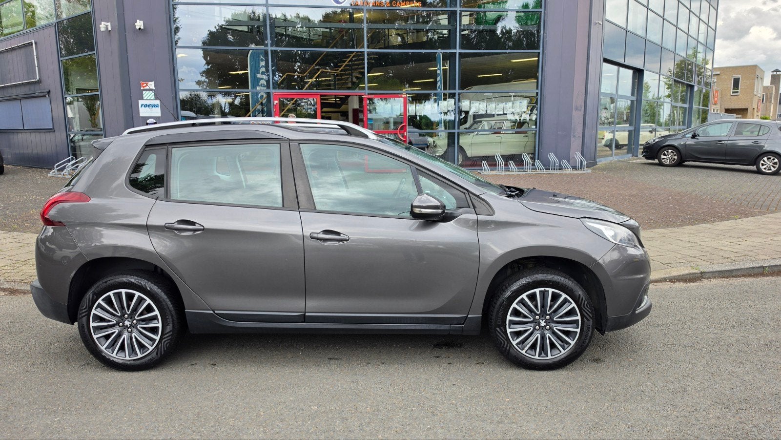 Peugeot 2008 1.2 VTI 81KW 2018 Grijs, Auto's, Peugeot, Voorwielaandrijving, Stof, 1250 kg, Zwart
