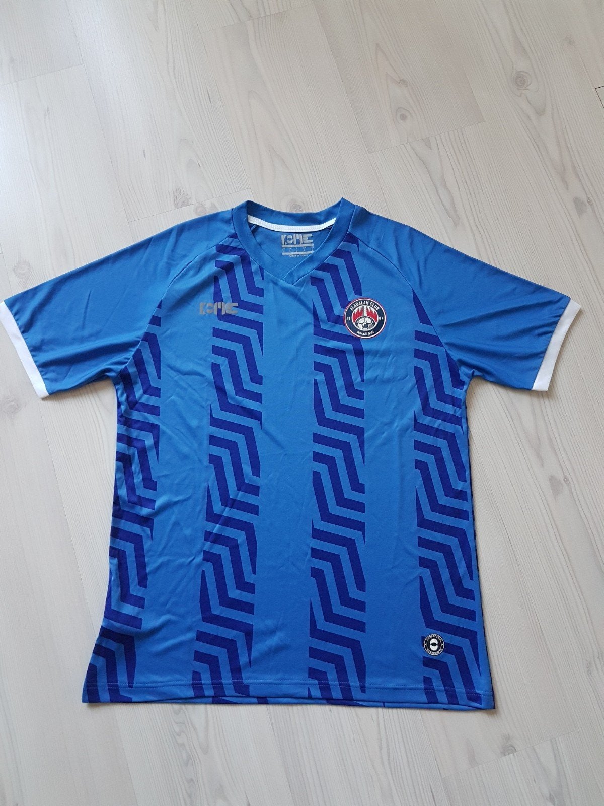 Aladalah Club heren voetbalshirt size large, Ophalen of Verzenden, Zo goed als nieuw, Shirt