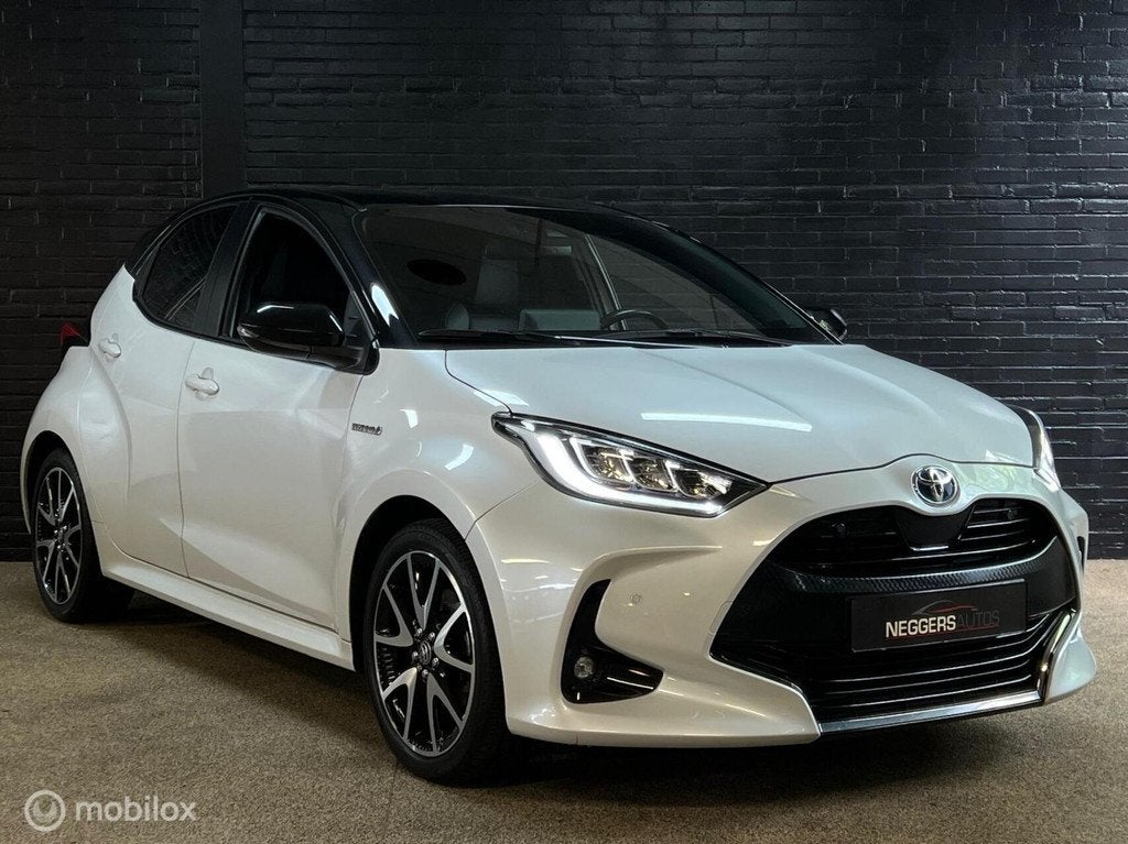 Toyota Yaris 1.5 Hybrid Executive | HUD | Navi | Stoelvw |, Auto's, Toyota, Gebruikt, Overige carrosserieën, 116 pk, Wit