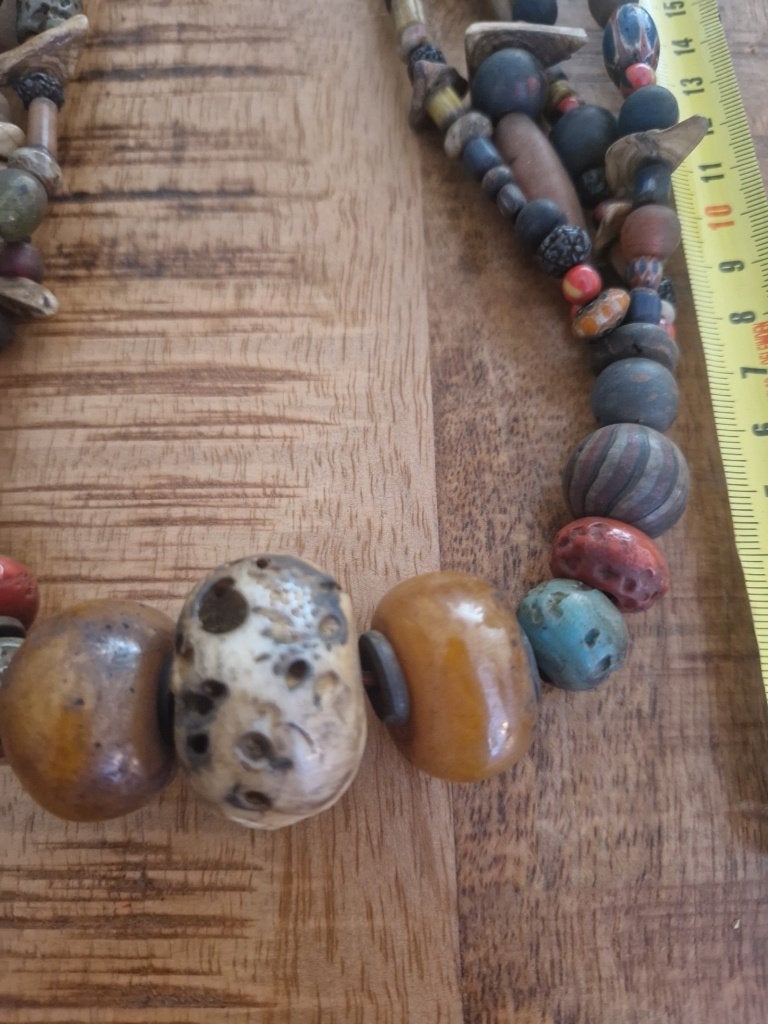 Etnische ketting met amberkralen en been., Ophalen of Verzenden