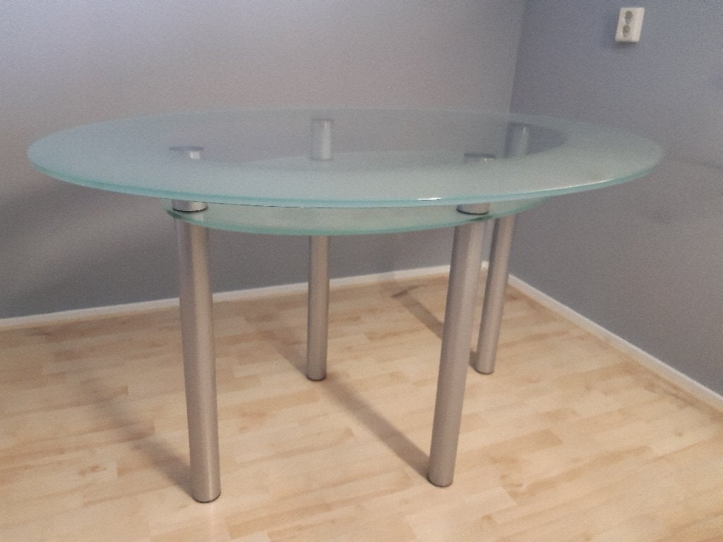 Glazen eettafel met metalen poten, Ophalen, Gebruikt, 100 tot 150 cm, 50 tot 100 cm