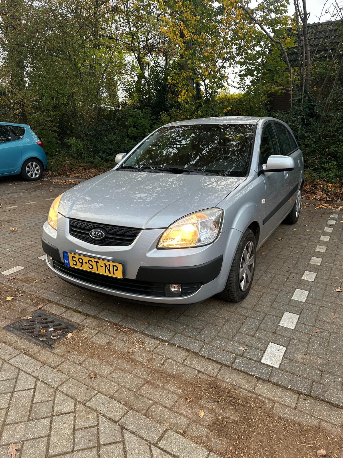 Kia Rio 1.4 HB x-tra 2006 Grijs, Auto's, Kia, Voorwielaandrijving, Stof, Zwart, 4 cilinders