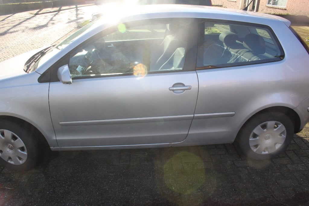 Volkswagen Polo 1.4 16V 59KW 2007 Grijs, Auto's, Voorwielaandrijving, Stof, 40 €/maand, 4 cilinders