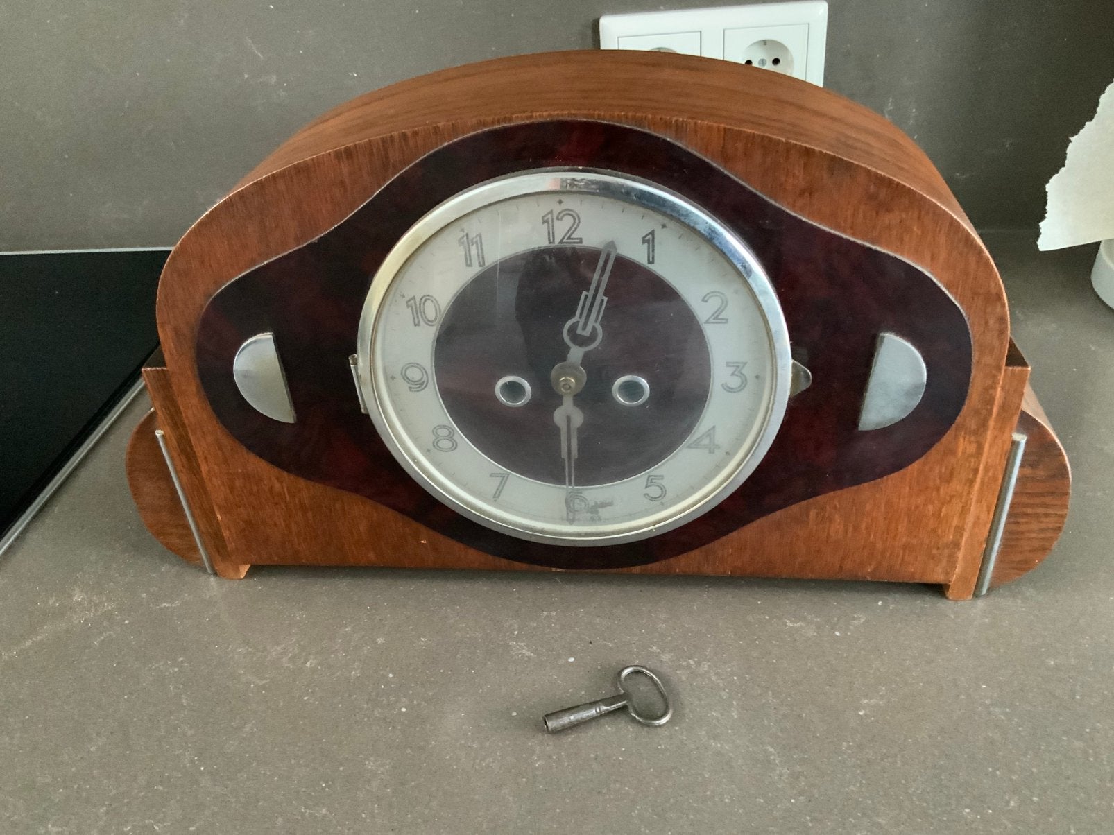 Kleine pendule klok, Ophalen