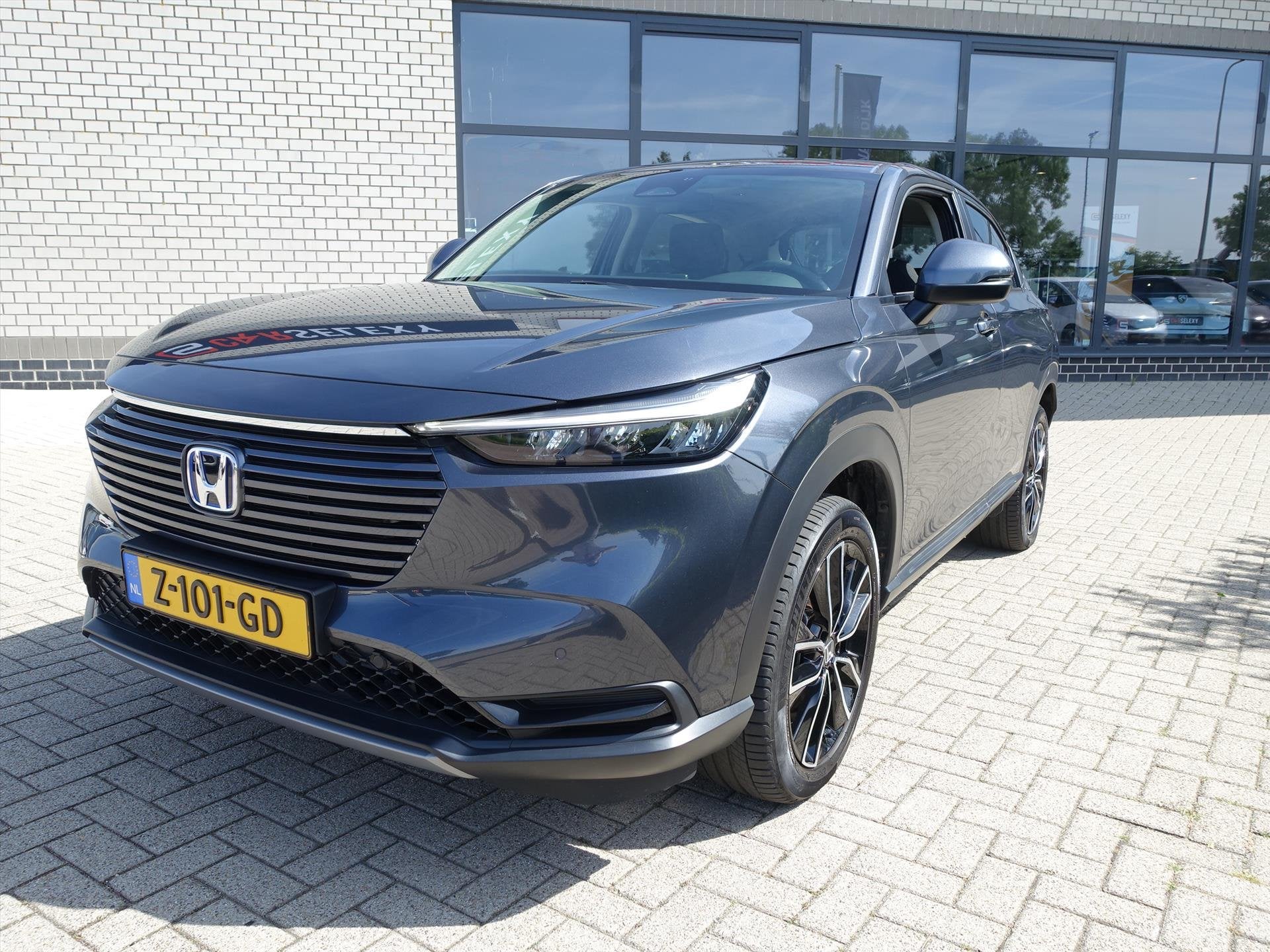 HONDA HR-V 1.5 i-MMD 131pk CVT Elegance met 7276 km erop, Auto's, Dealer onderhouden, Stof, Origineel Nederlands, 19 km/l