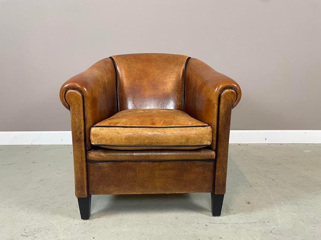 Schapenleren clubfauteuil Lounge Atelier met vintage kussen, Huis en Inrichting, Fauteuils, Ophalen, Gebruikt, Leer