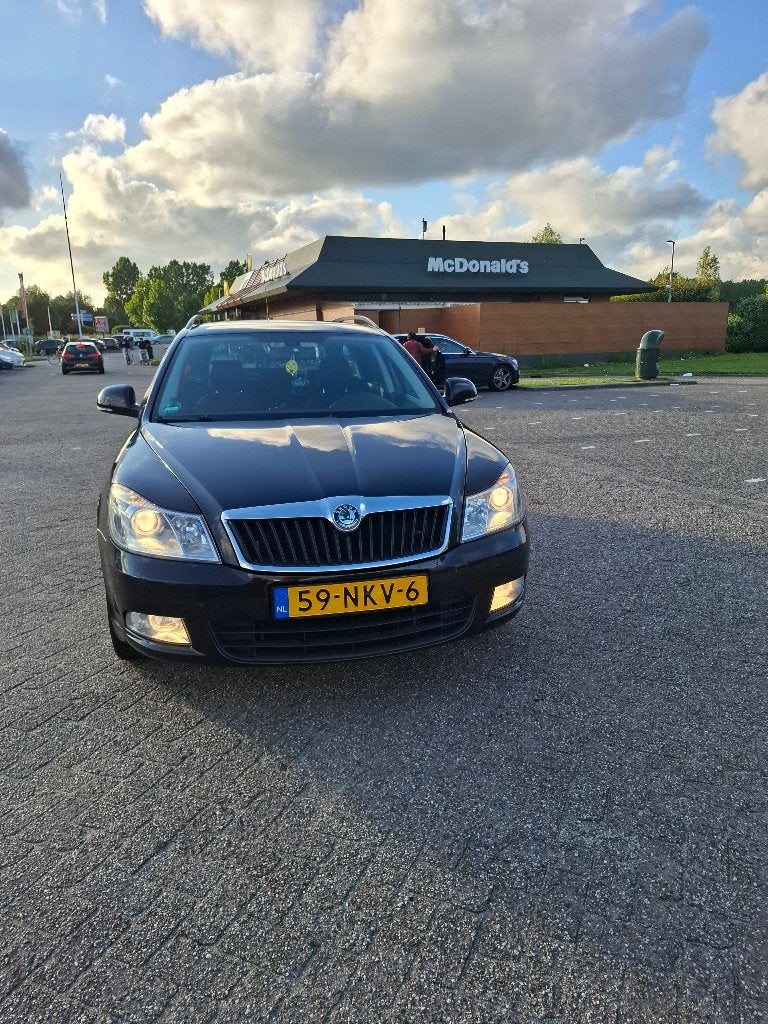 Skoda Octavia 1.4 TSI 90KW Combi 2010 Zwart, Auto's, Voorwielaandrijving, Euro 5, 1225 kg, 4 cilinders