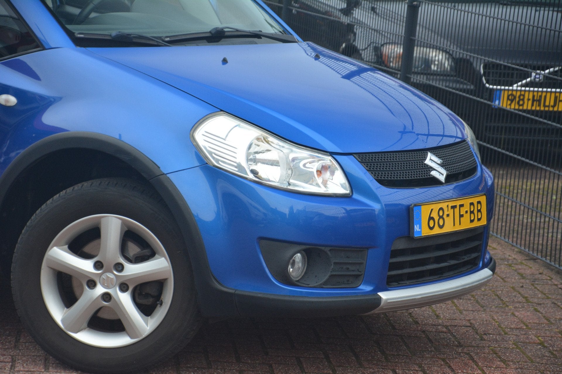 Suzuki SX4 1.6 4Grip Exclusive | 4x4 | Trekhaak | Airco | NL, Stof, Gebruikt, Zwart, 4 cilinders