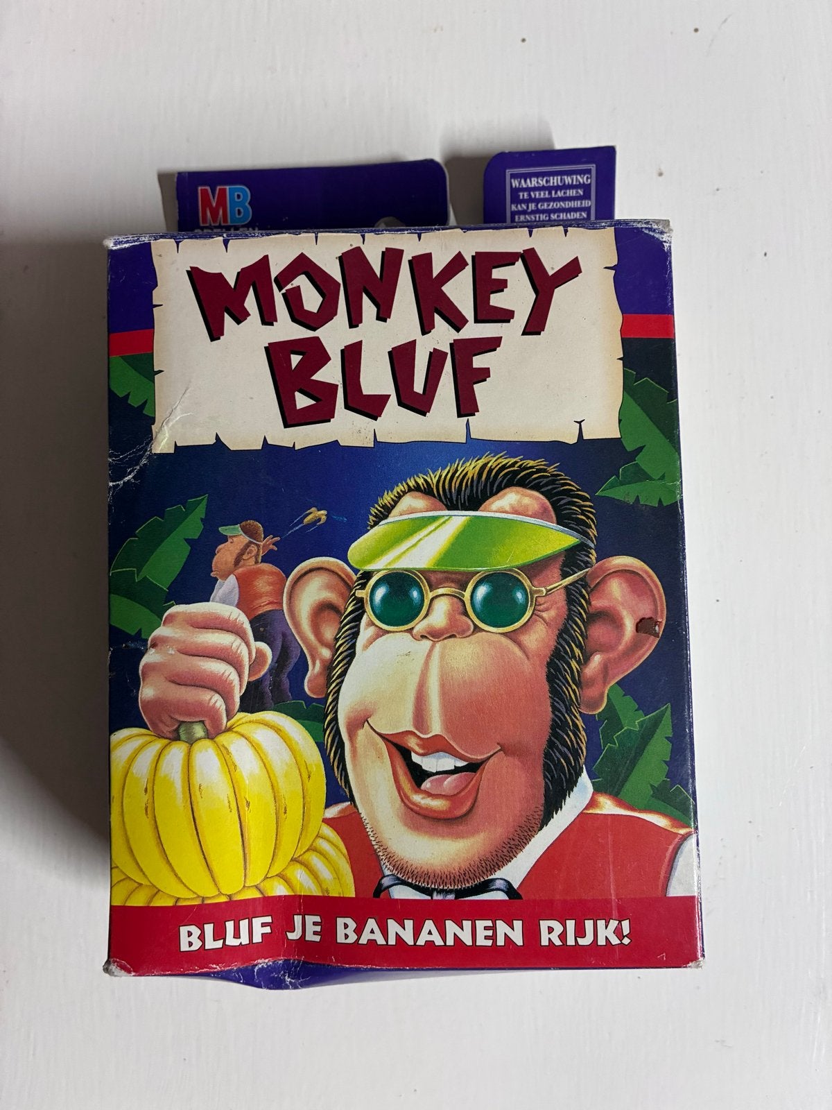 Monkey Bluff - Bluf je bananen rijk! MB Spellen, Hobby en Vrije tijd, Gezelschapsspellen | Bordspellen, Een of twee spelers, Ophalen of Verzenden