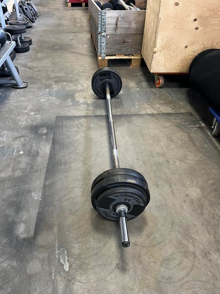 Technogym vaste halterstang 32 kg gewicht, Sport en Fitness, Fitnessmaterialen, Ophalen, 32 kg, Vaste stang, Halterset