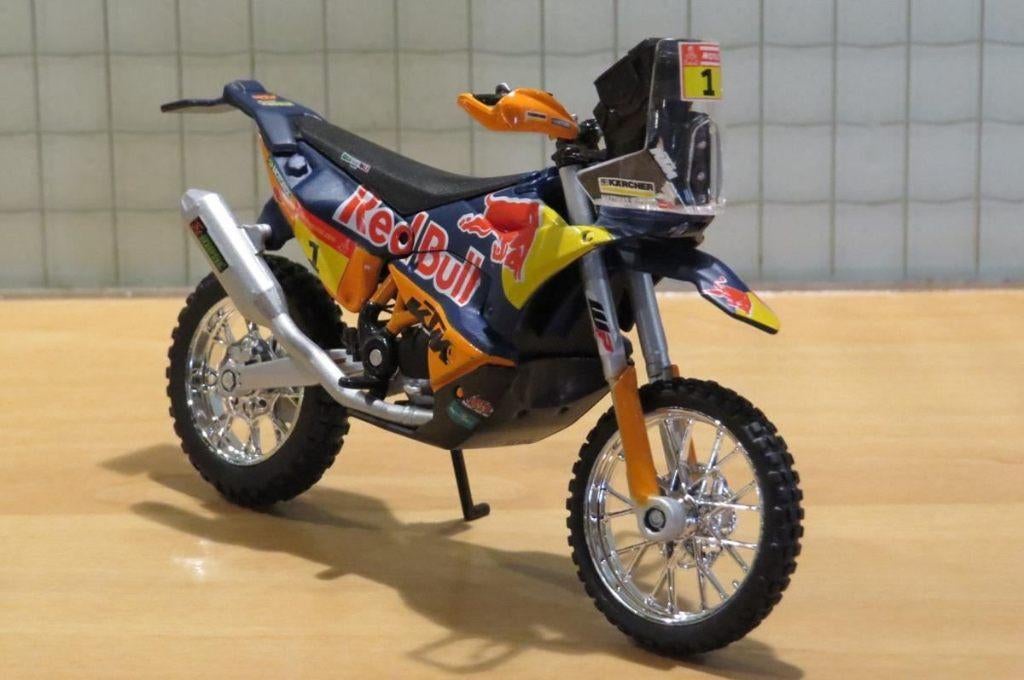 Toby Price KTM 450 Dakar Rally Red Bull 1:18 #1 Bburago, May Cheong Group France S.A.S., Nieuw, Ophalen of Verzenden, Parc Ariane - Le Vénus