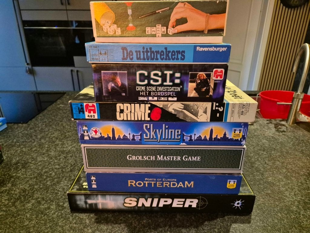 8 klassieke bordspellen–Rotterdam, CSI, Crime, Skyline e.a., Ophalen, Gebruikt
