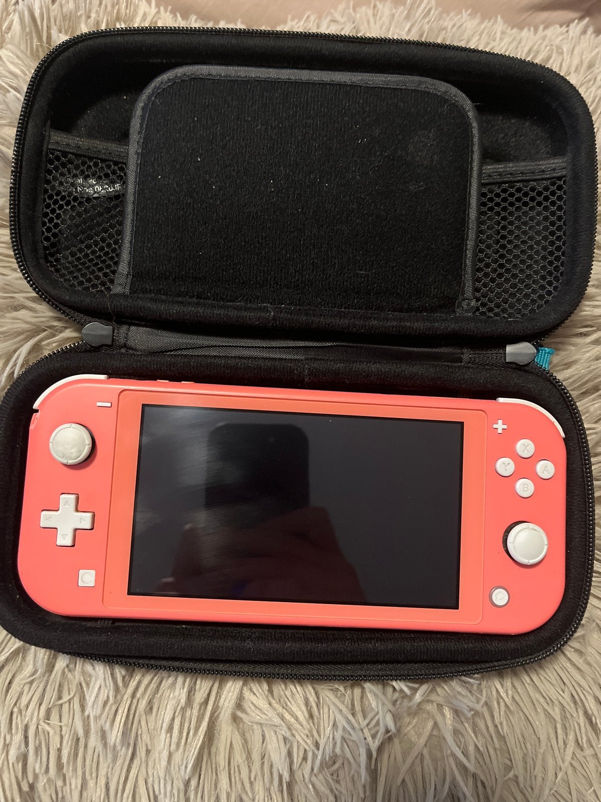 Nintendo Switch Lite Coral met beschermhoes, Ophalen of Verzenden, Roze of Coral, Zo goed als nieuw, Met beschermhoes of tas