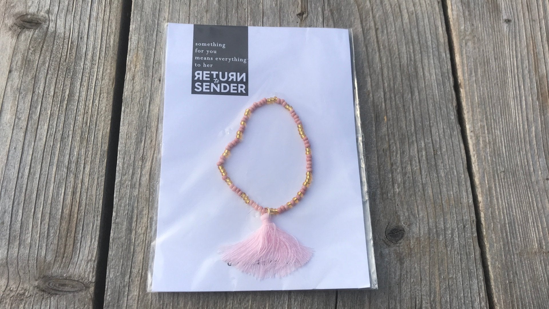 Nieuw Return to sender armbandje geluksarmband handgemaakt, Kunststof of Plastic, Nieuw, Ophalen of Verzenden, Roze