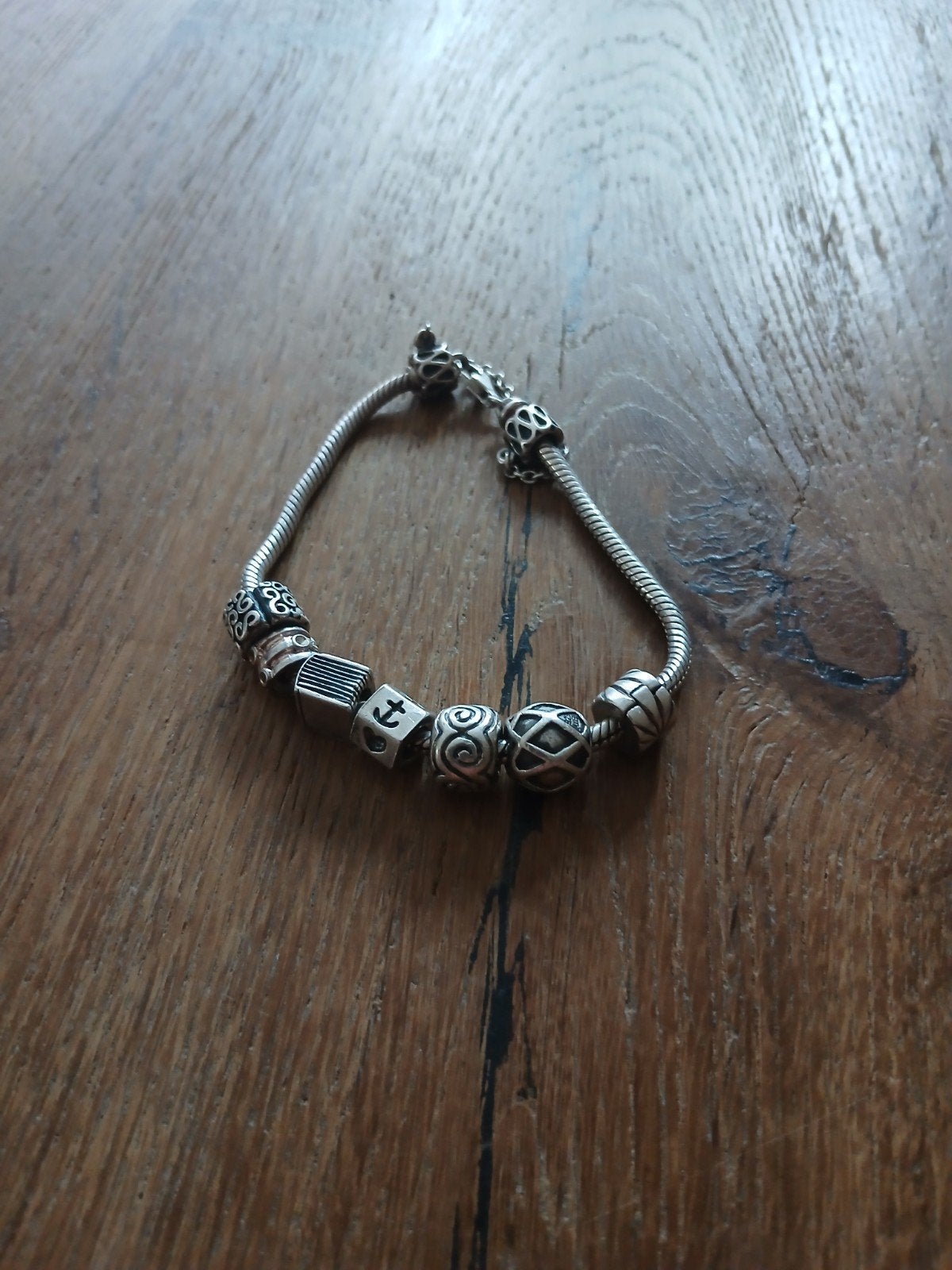 Zilveren pandora bedelarmband met diverse bedels, Sieraden, Tassen en Uiterlijk, Armbanden, Gebruikt, Ophalen of Verzenden, Met bedels of kralen