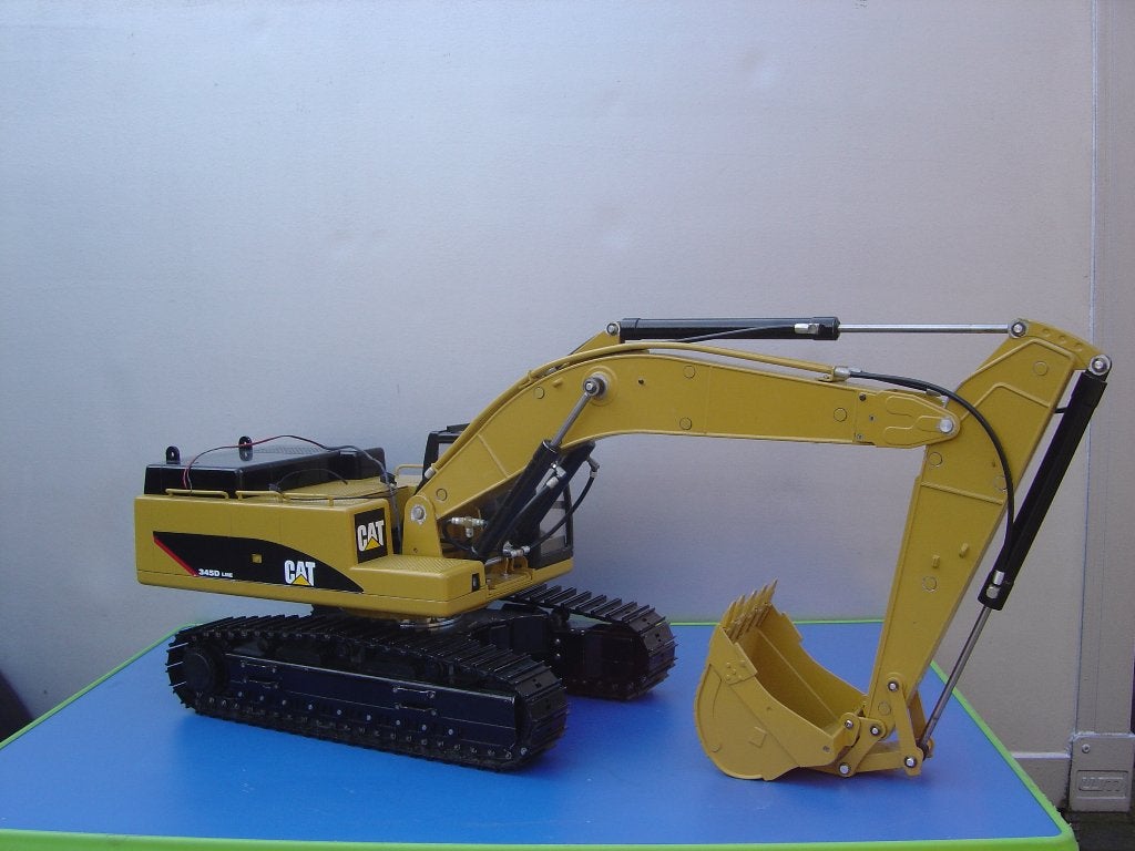 WEDICO CAT 345D Graafmachine, Ophalen, Zo goed als nieuw