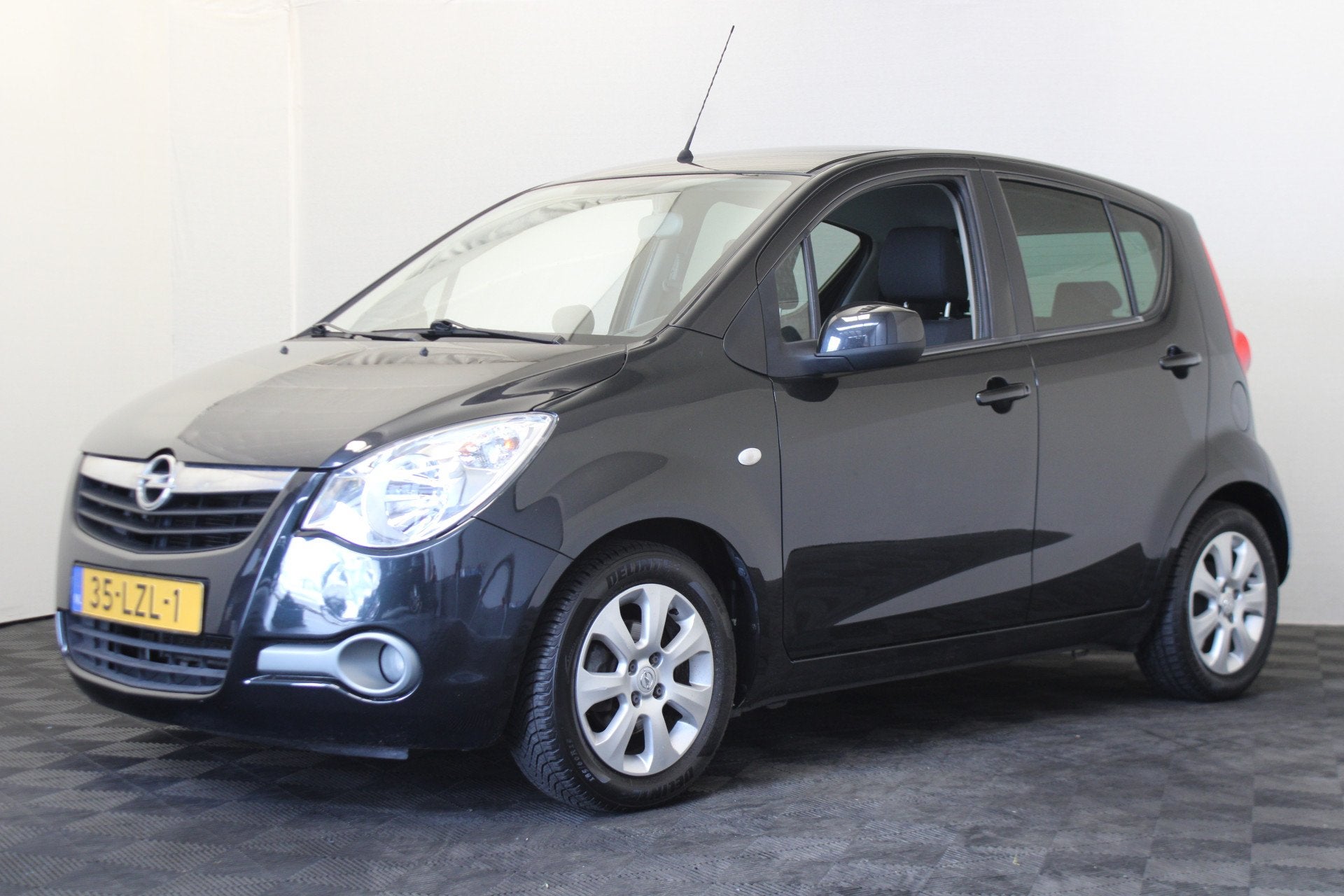 Opel Agila 1.2 Edition (bj 2010), Auto's, Voorwielaandrijving, 4 cilinders, 965 kg, Zwart