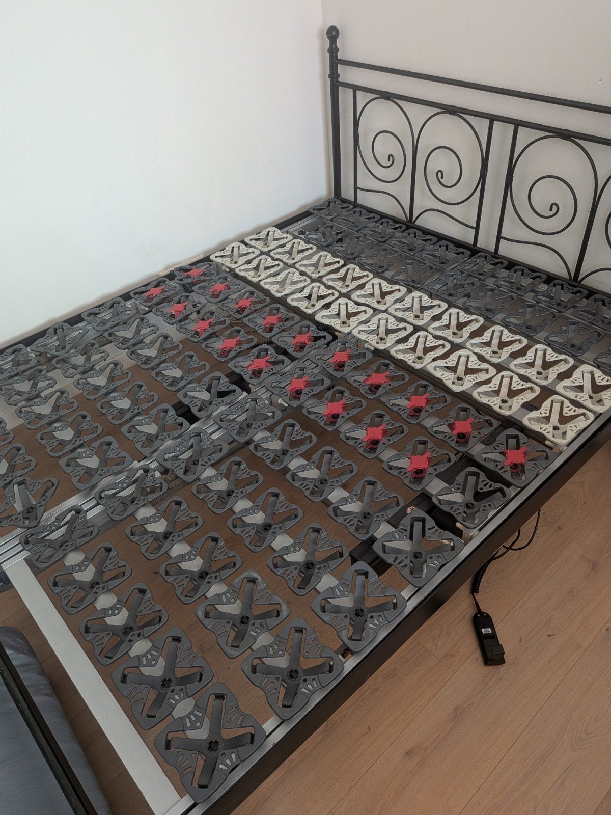 Elektrische lattenbodem met metalen bedframe, Ophalen