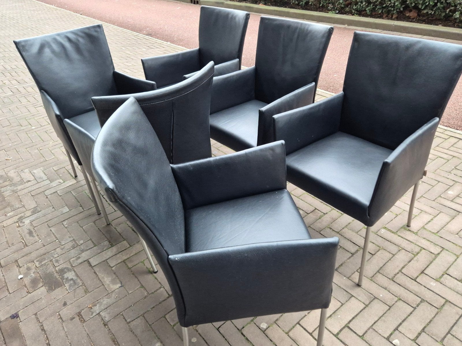8 Bert plantagie design eetkamerstoelen Arc zwart leer rvs, Ophalen, Gebruikt, Zwart, Montel eijerkamp piet klercx  stijl