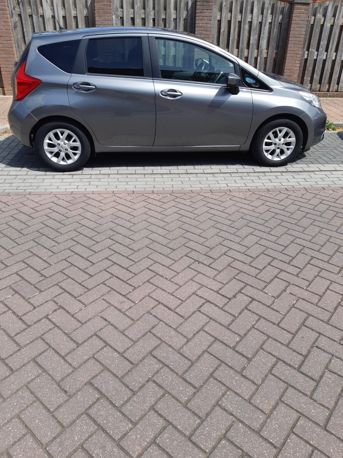Nissan Note 1.2 59KW/80PK 2015 Grijs 119 dkm airco, camera, Auto's, Nissan, 980 kg, 1198 cc, 49 €/maand, Handgeschakeld
