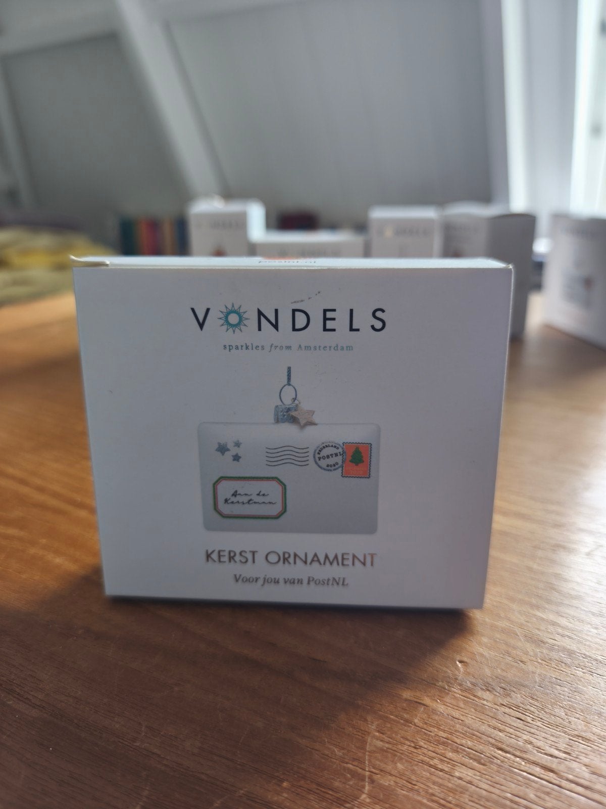 Vondels kerstornament PostNL 2020, Ophalen