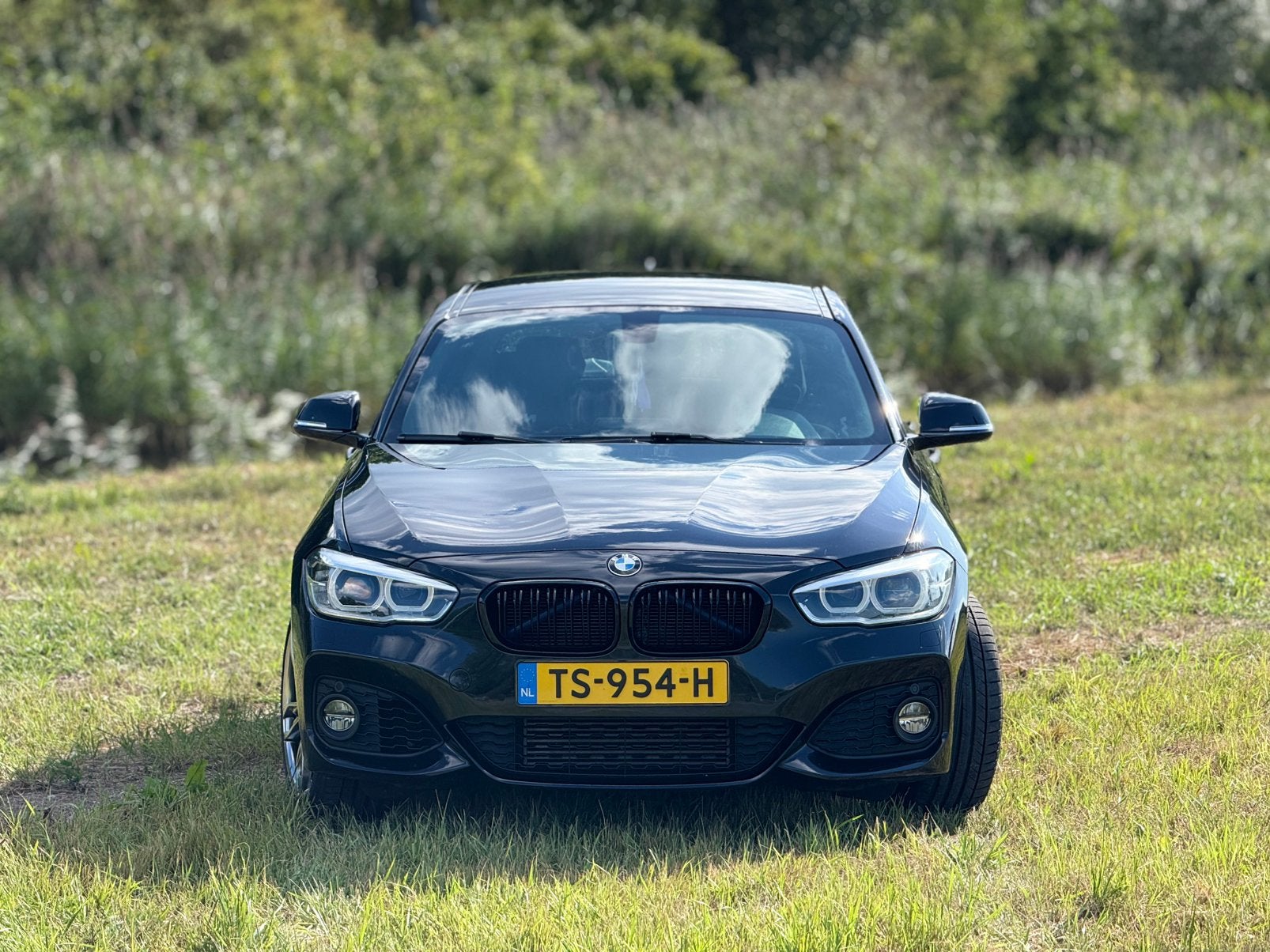 BMW 1-Serie 118i 136pk Aut 2018 Zwart, Alcantara, Zwart, 650 kg, Particulier