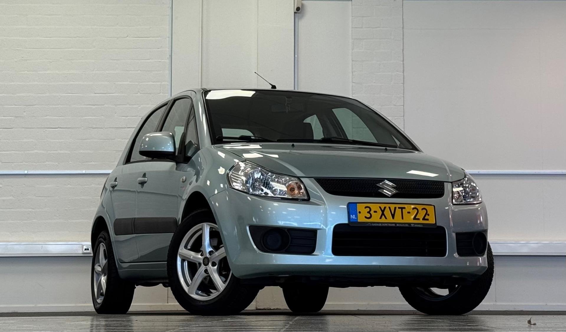 Suzuki SX4 1.5i 16V Comfort Trekhaak Airco Garantie, Auto's, Voorwielaandrijving, Gebruikt, Zwart, 4 cilinders