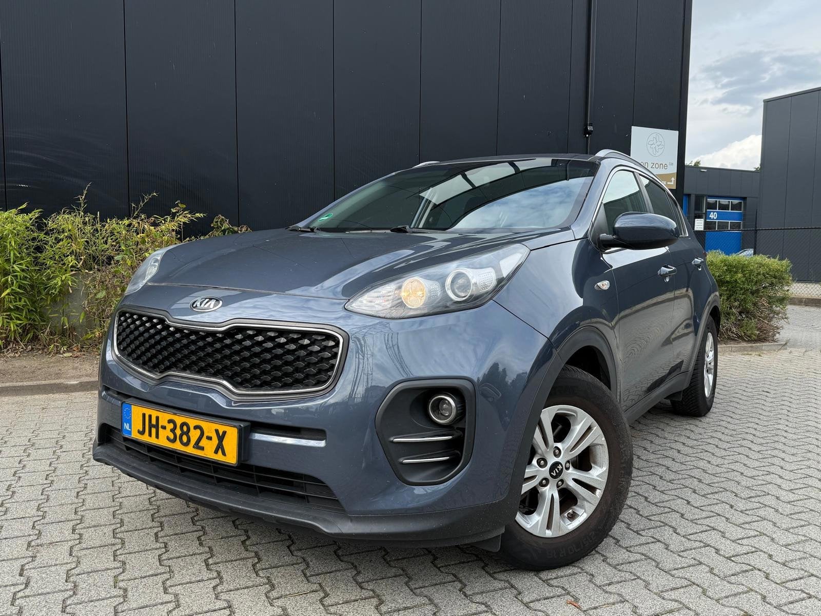 Kia Sportage 1.6 GDI ComfortLine Navigator, Voorwielaandrijving, Gebruikt, 4 cilinders, Blauw