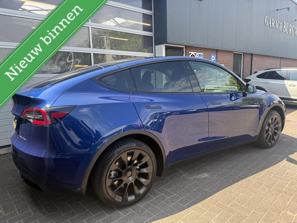 Tesla Model Y Long Range AWD 75 kWh SOH 92% TREKHAAK *ALL-IN, 12 maanden, Gebruikt, Zwart, Blauw