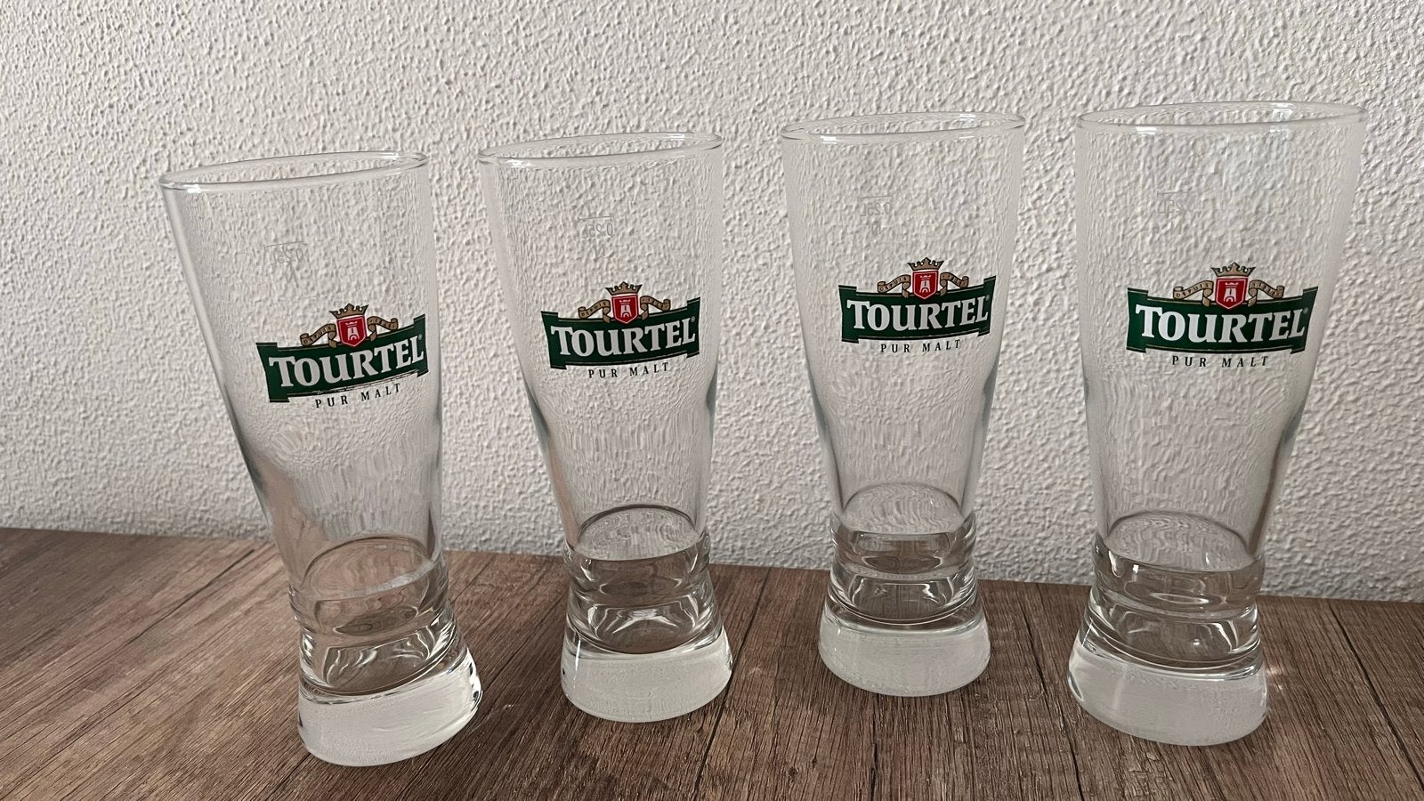 Set van 4 Tourtel bierglazen - 24 cm hoog, Ophalen of Verzenden, Zo goed als nieuw, Overige merken, Glas