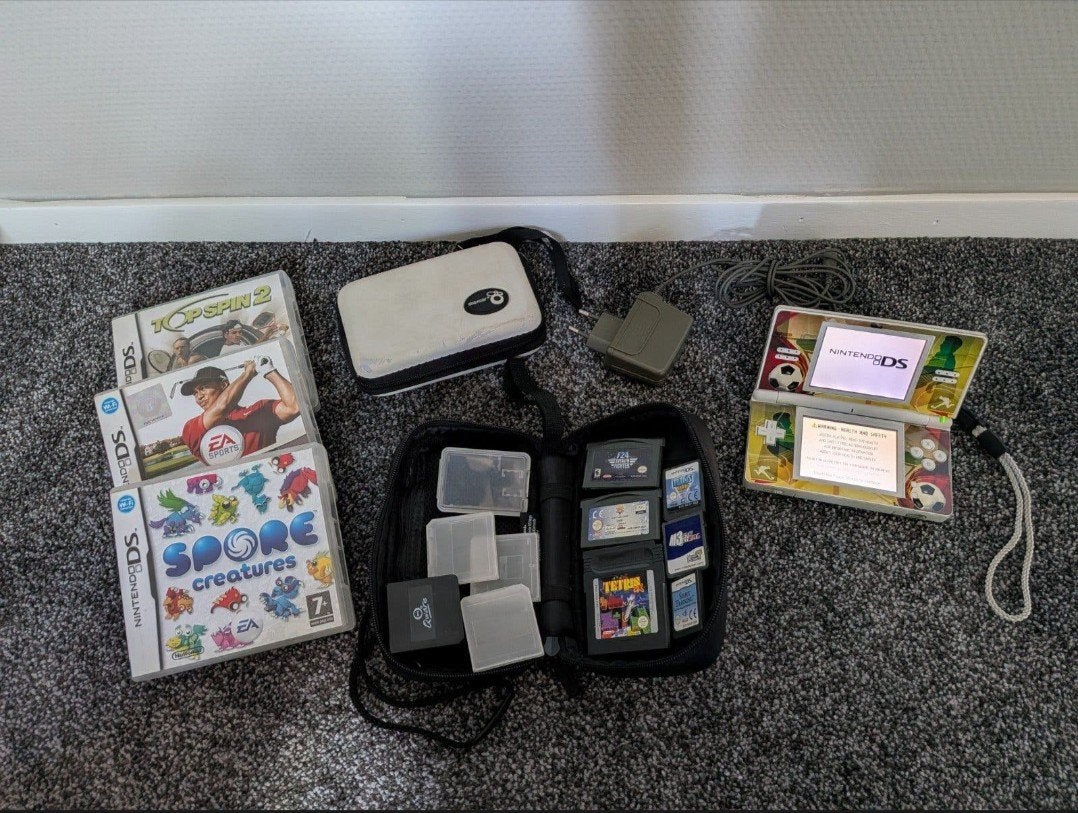 Complete Nintendo DS set met spellen en accessoires, Spelcomputers en Games, 1 speler, Ophalen of Verzenden, Gebruikt, Sport