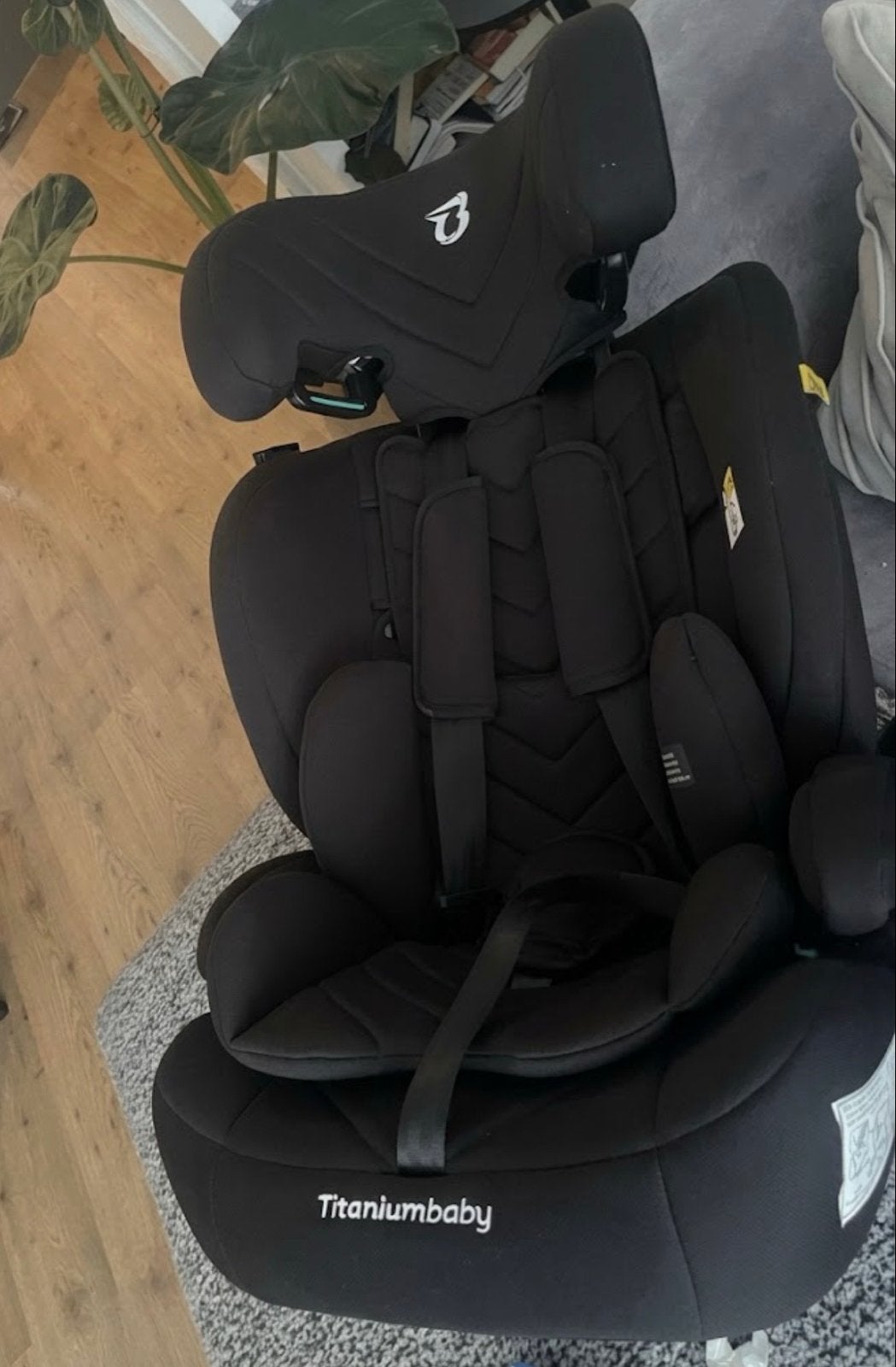 Titaniumbaby autostoel - Zwart - Zo goed als nieuw, Autogordel, Zijbescherming, Zo goed als nieuw, 9 t/m 36 kg